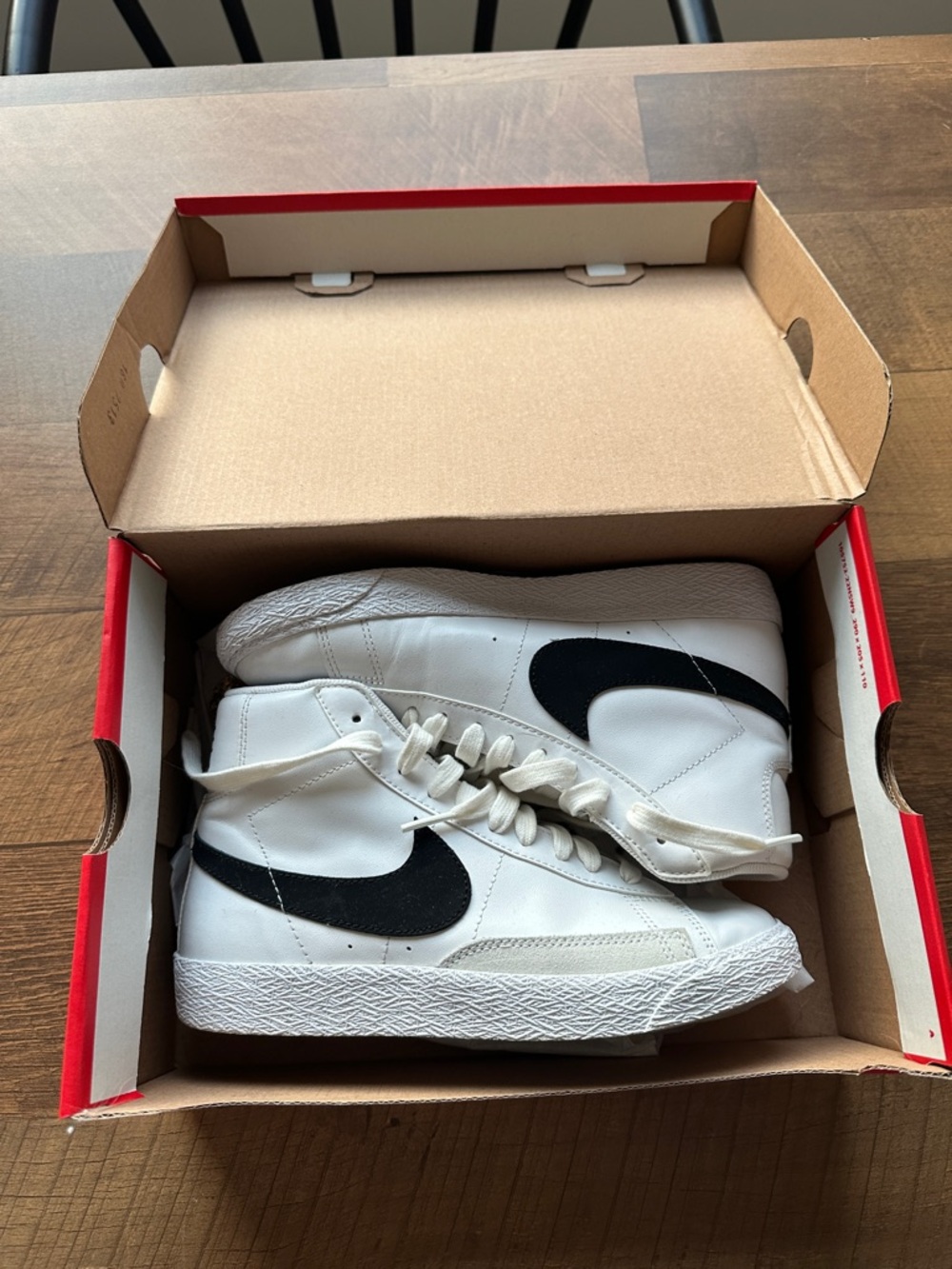Nike Blazer White Leather Mid-Top Sneakers with Black Swoosh Accents